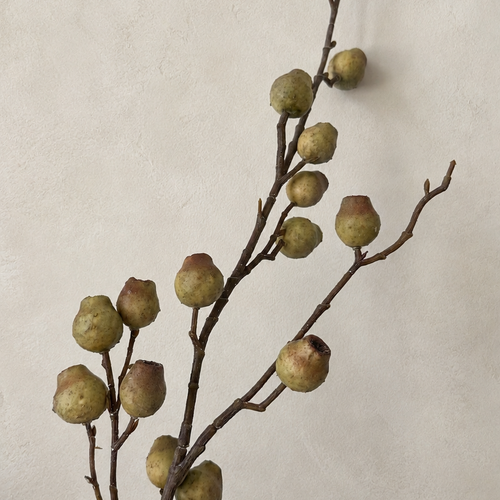 Antique Moss artificial berry branch close-up with earthy green berry texture