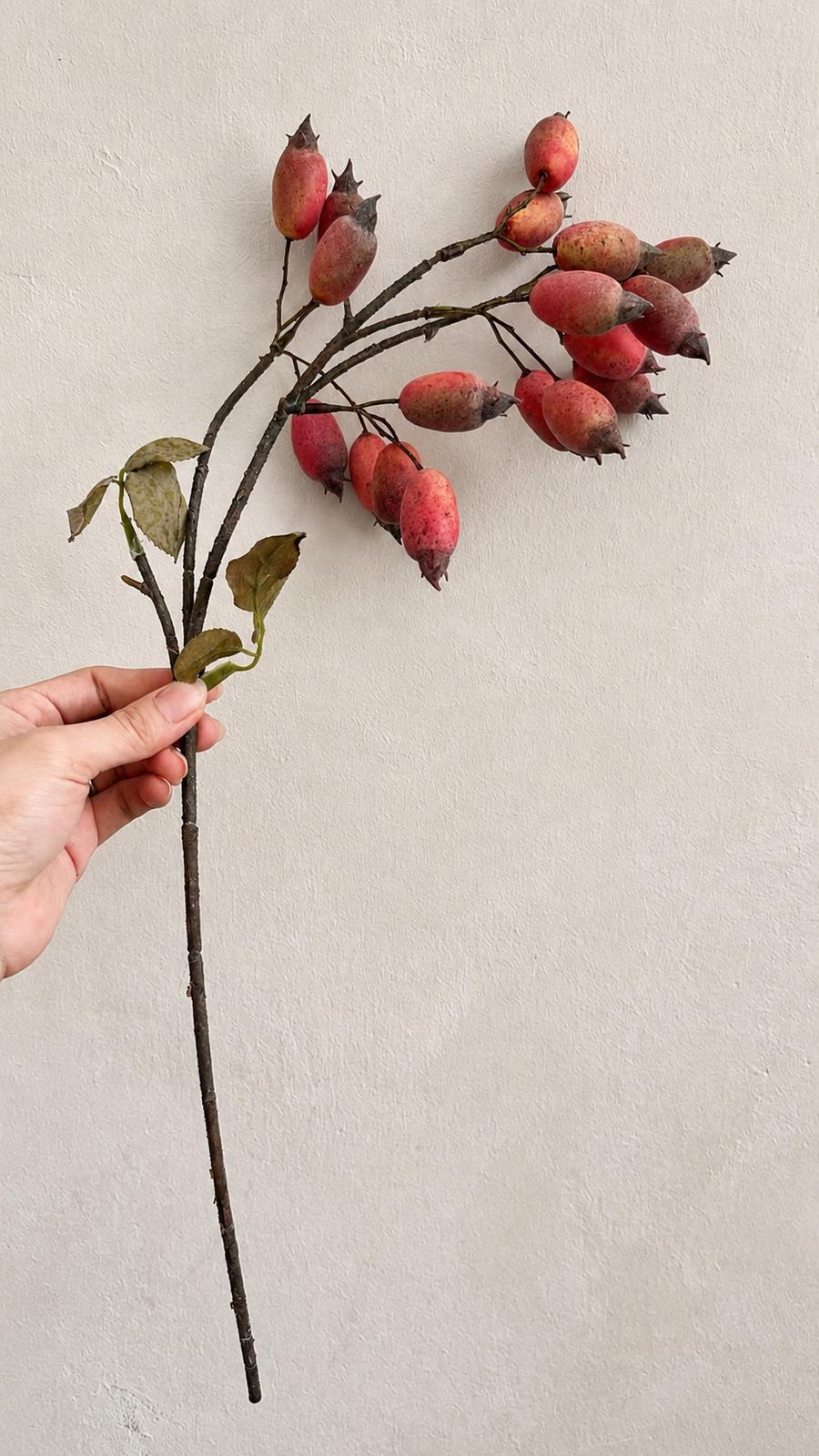 Weathered faux rosehip branch for warm seasonal home decor