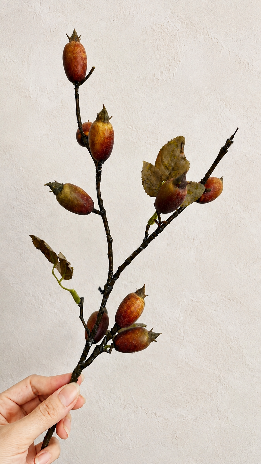 Weathered faux rosehip branch for seasonal home decor