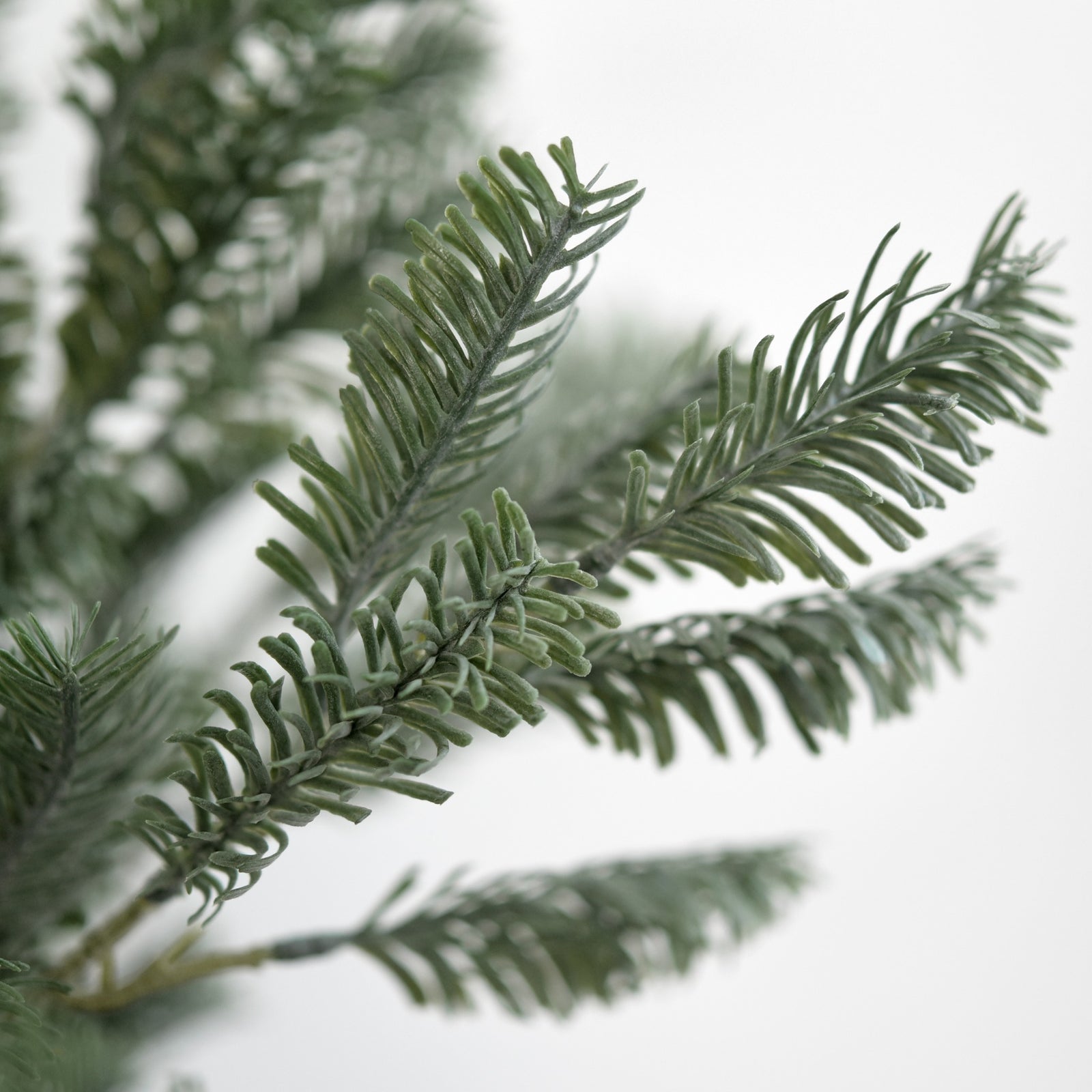 Close-up of soft-touch artificial pine needles and realistic texture
