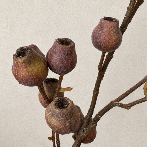 Weathered Russet artificial berry branch close-up with autumn berry texture