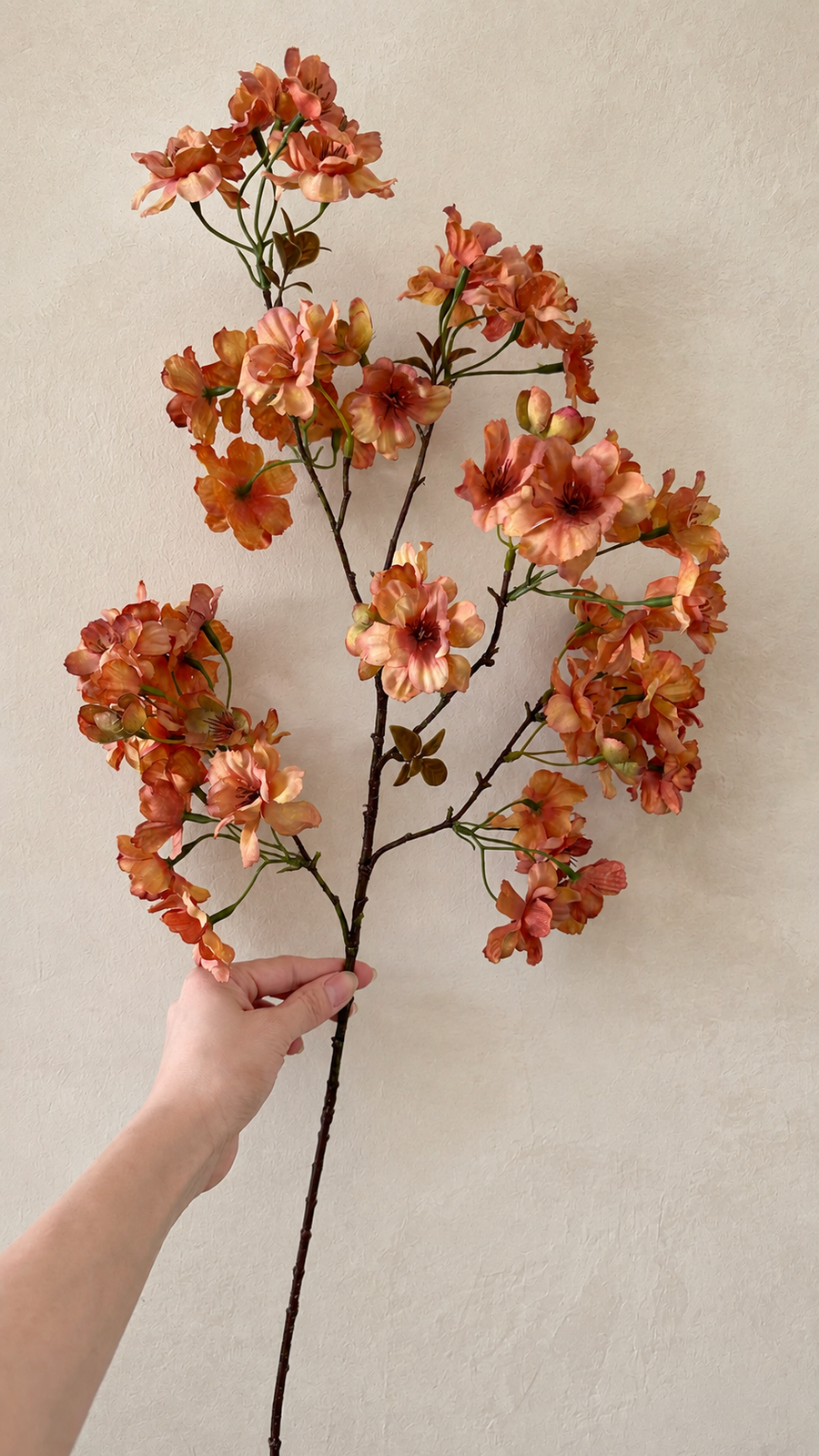 Full-length 37.4-inch autumn apricot artificial cherry blossom branch held for scale