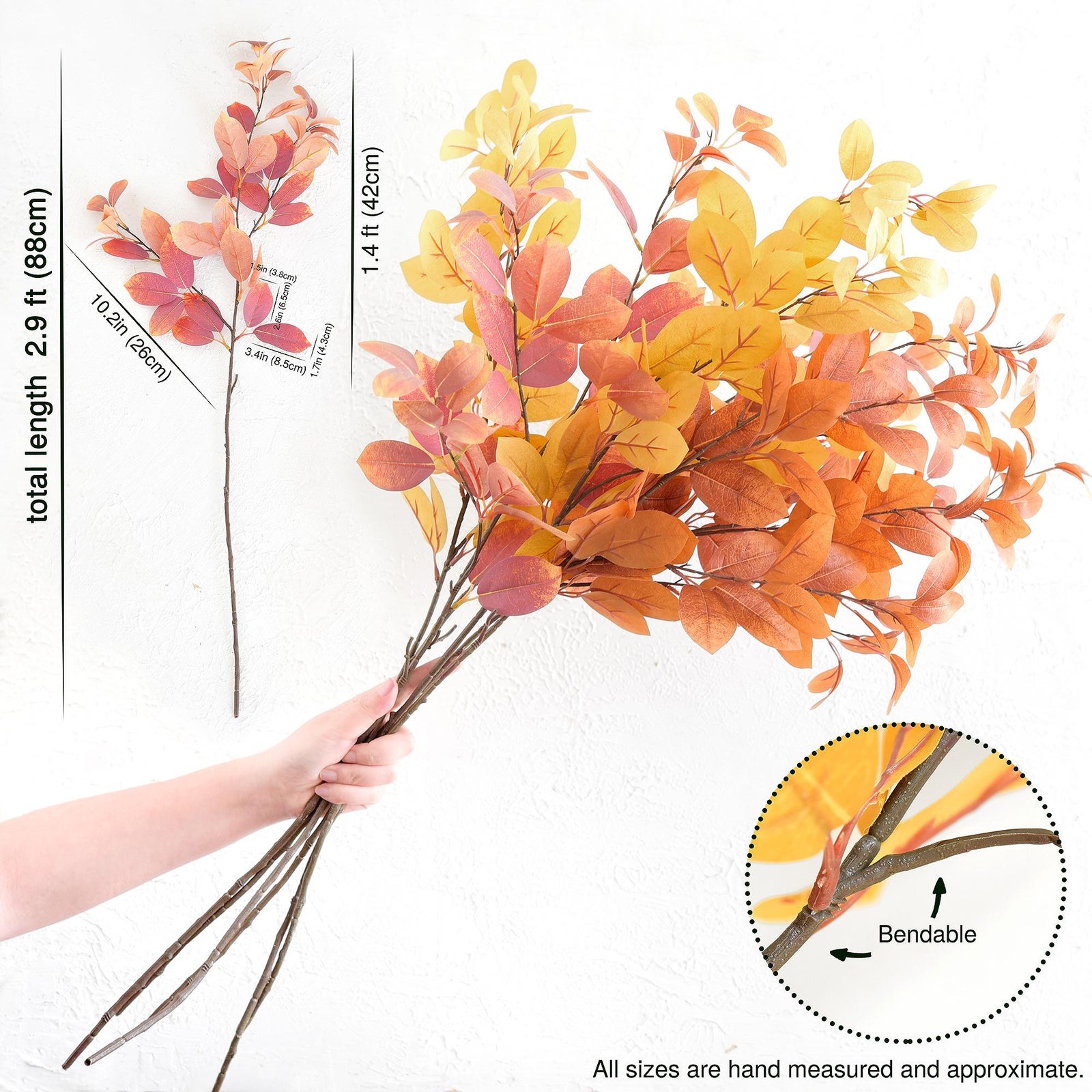 Flexible faux fall leaf branches shown in a mixed warm autumn palette.