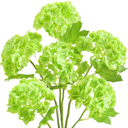 Six lime green real touch hydrangea stems with rounded blooms and green leaves on a white background.