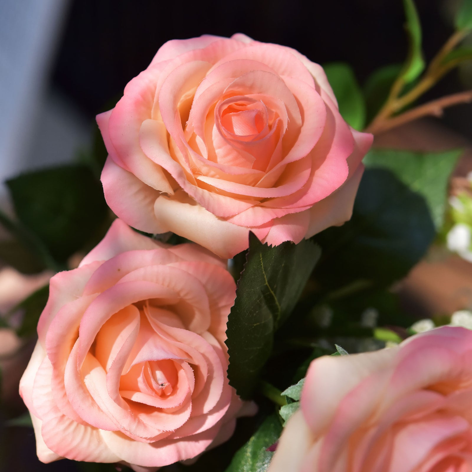 Love Peach Real Touch rose stems shown for bouquet and vase arrangement styling.