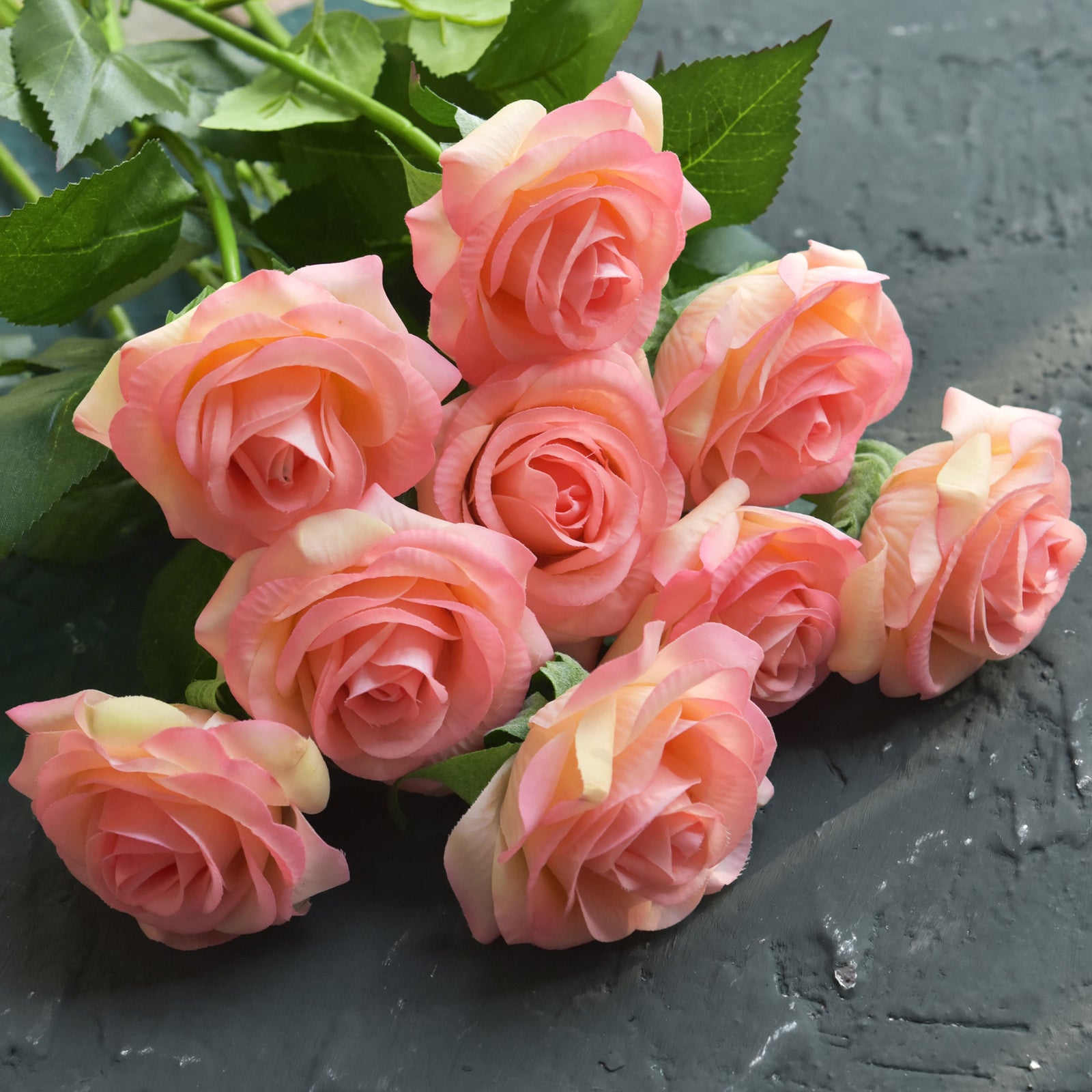 Love Peach artificial rose stems displayed for centerpiece and bouquet styling.