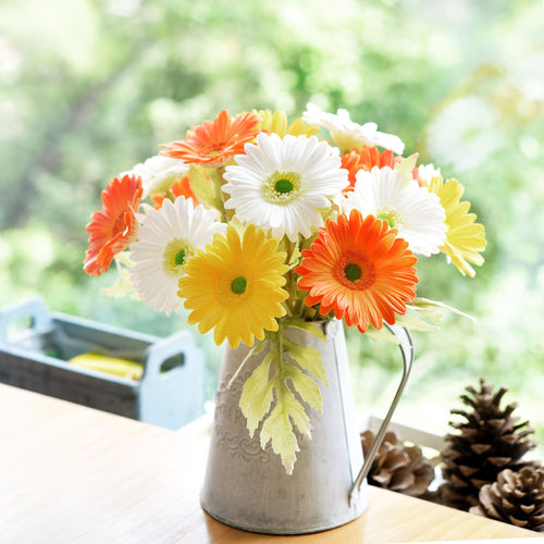 Marmalade orange artificial gerbera stems shown in a full product view.