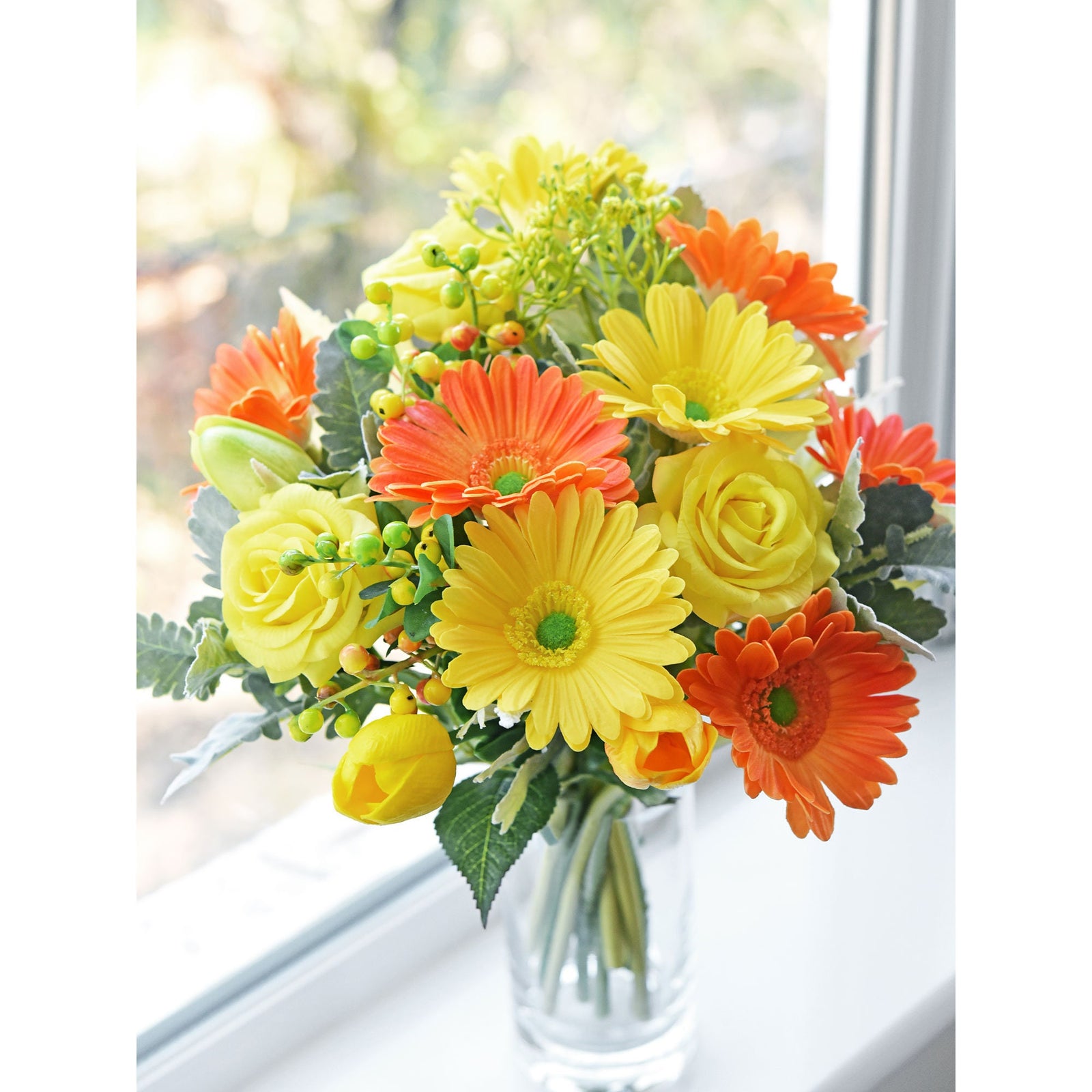 Marmalade orange gerbera stems showing layered flower heads and green stems.
