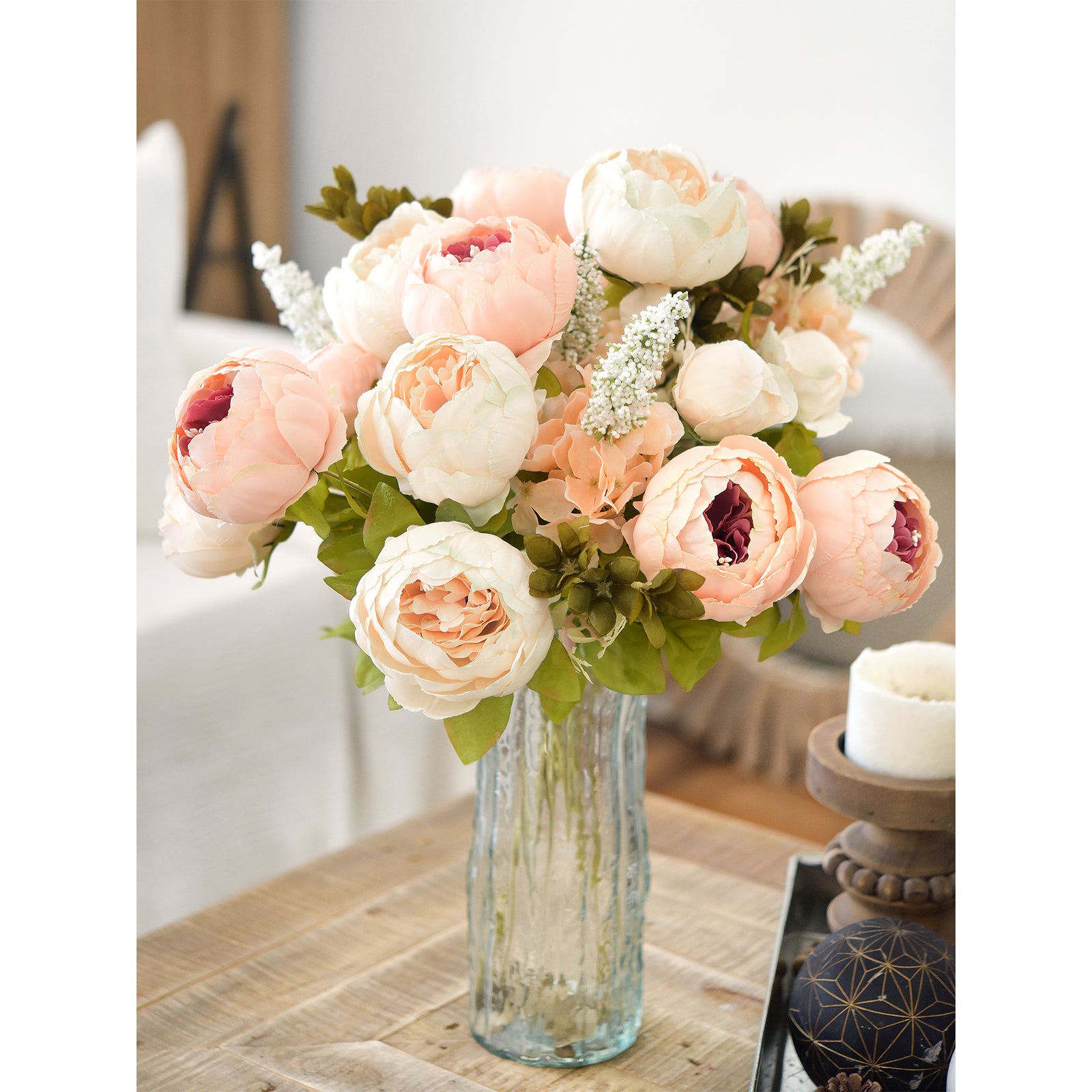 Pastel peony bouquet with cream, pink, and blush flowers arranged in a glass vase, perfect for elegant home décor.