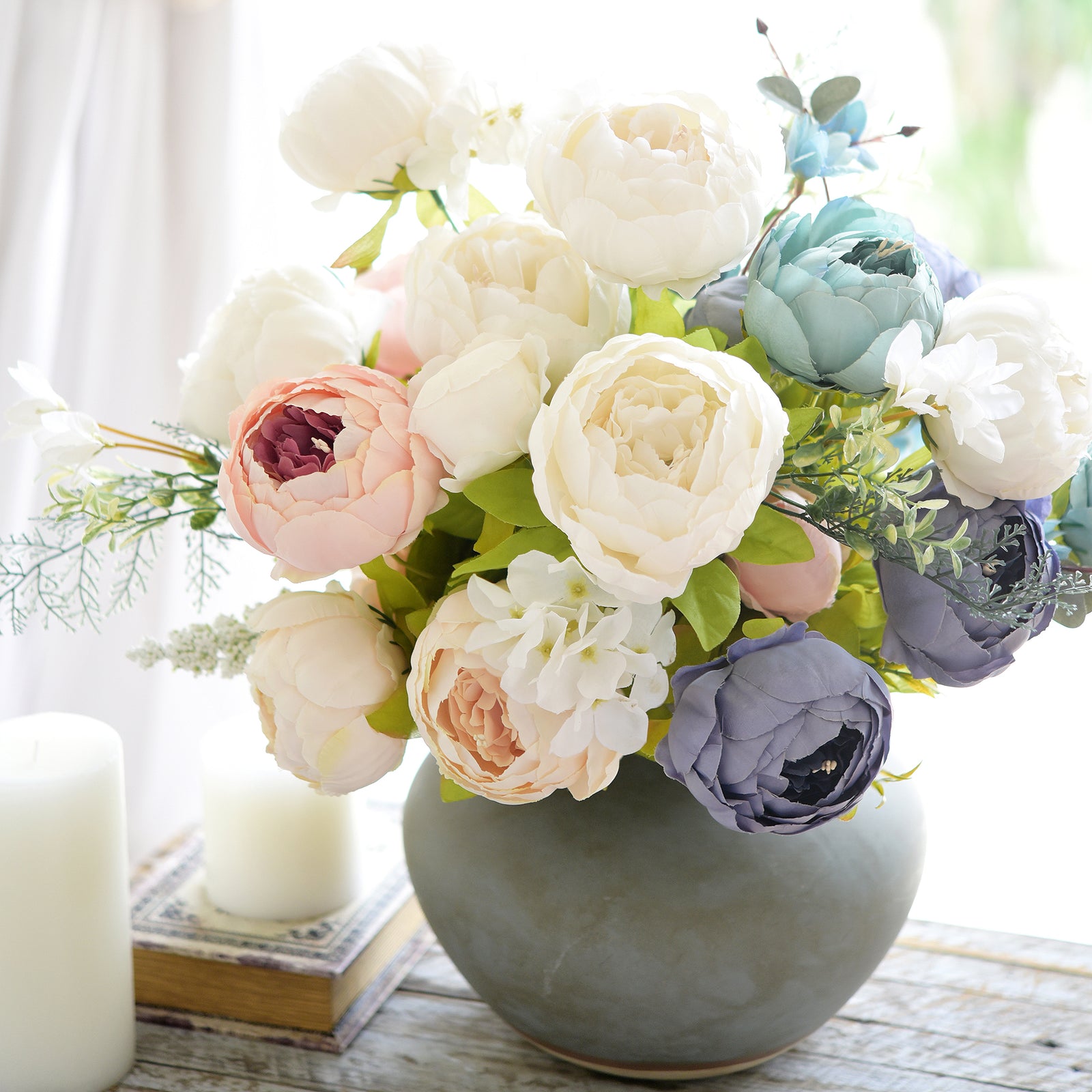 Pastel silk floral bouquet with white, pink, blue, and purple peonies arranged in a modern grey vase, perfect for home décor.