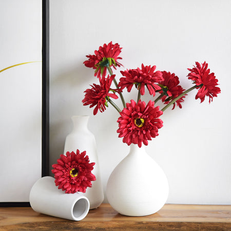 Artificial silk gerbera flower stems shown in an alternate product view.
