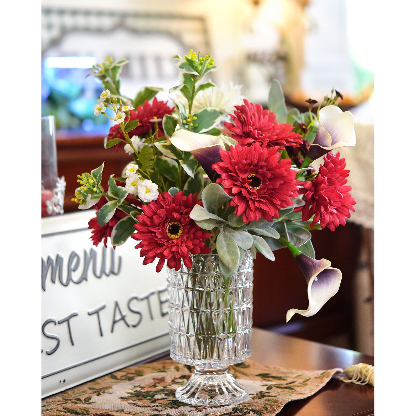 Silk gerbera flowers shown with layered blooms and green stems in a product view.