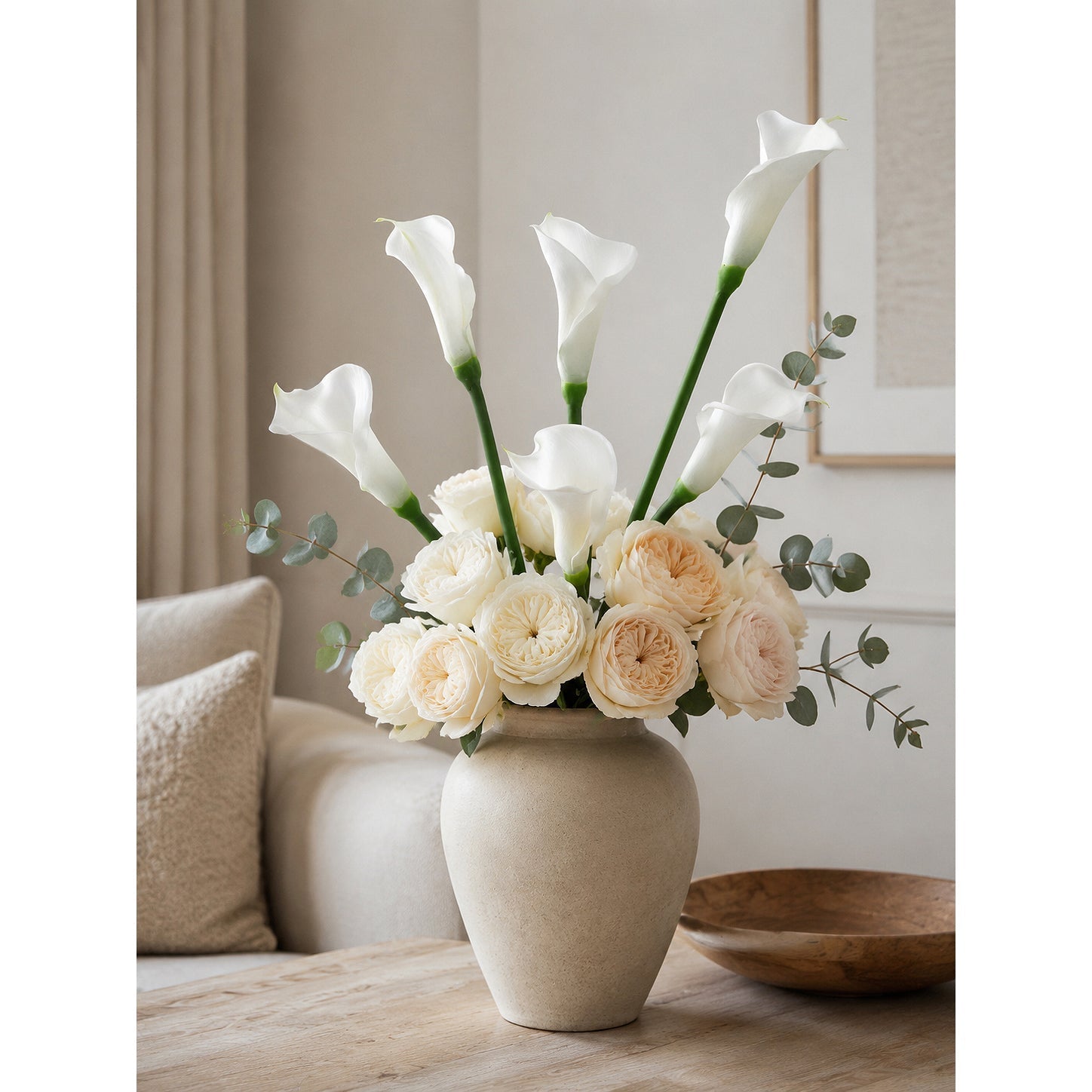 White calla lily flower heads and green stems, detail view