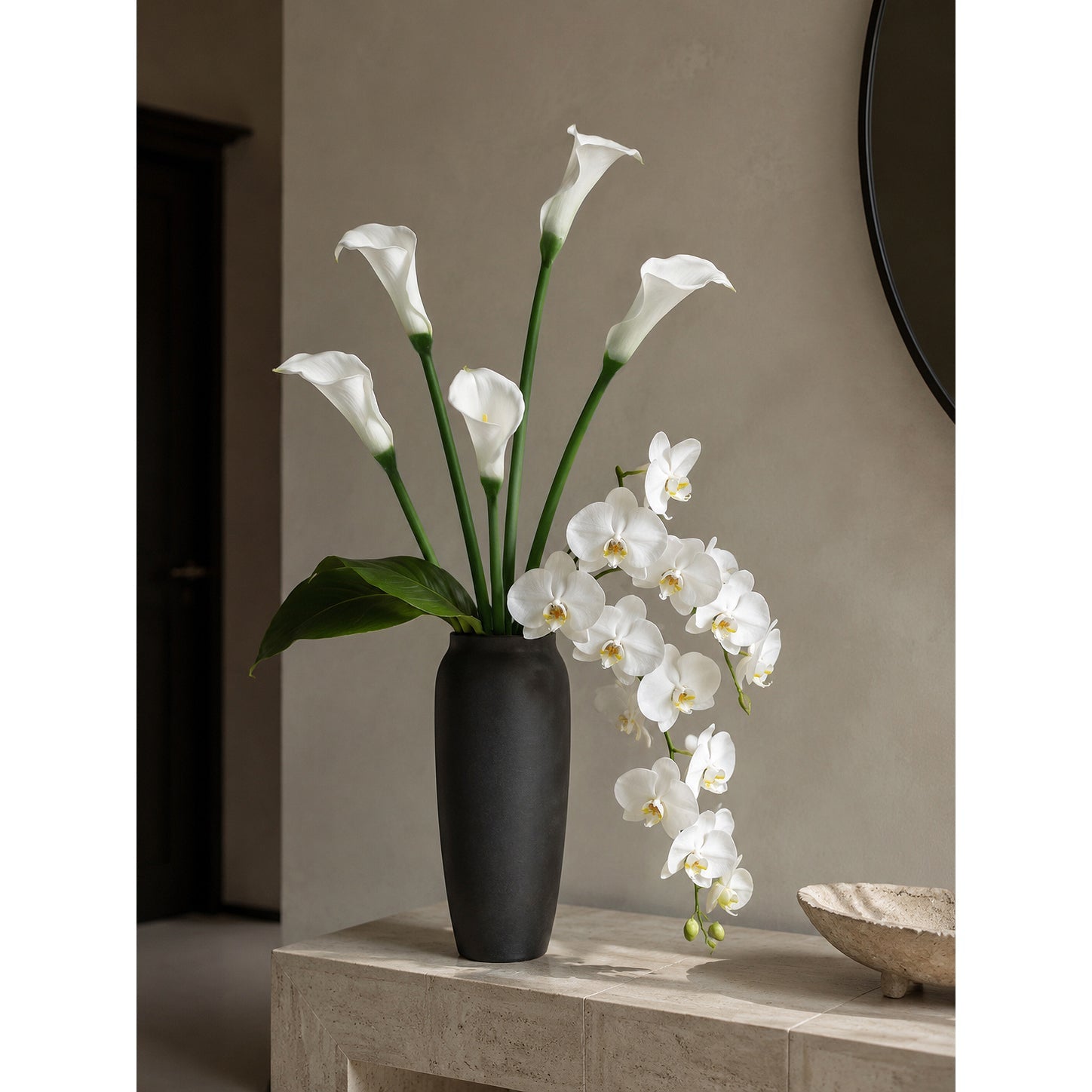 White calla lily petals and long green stems, close detail