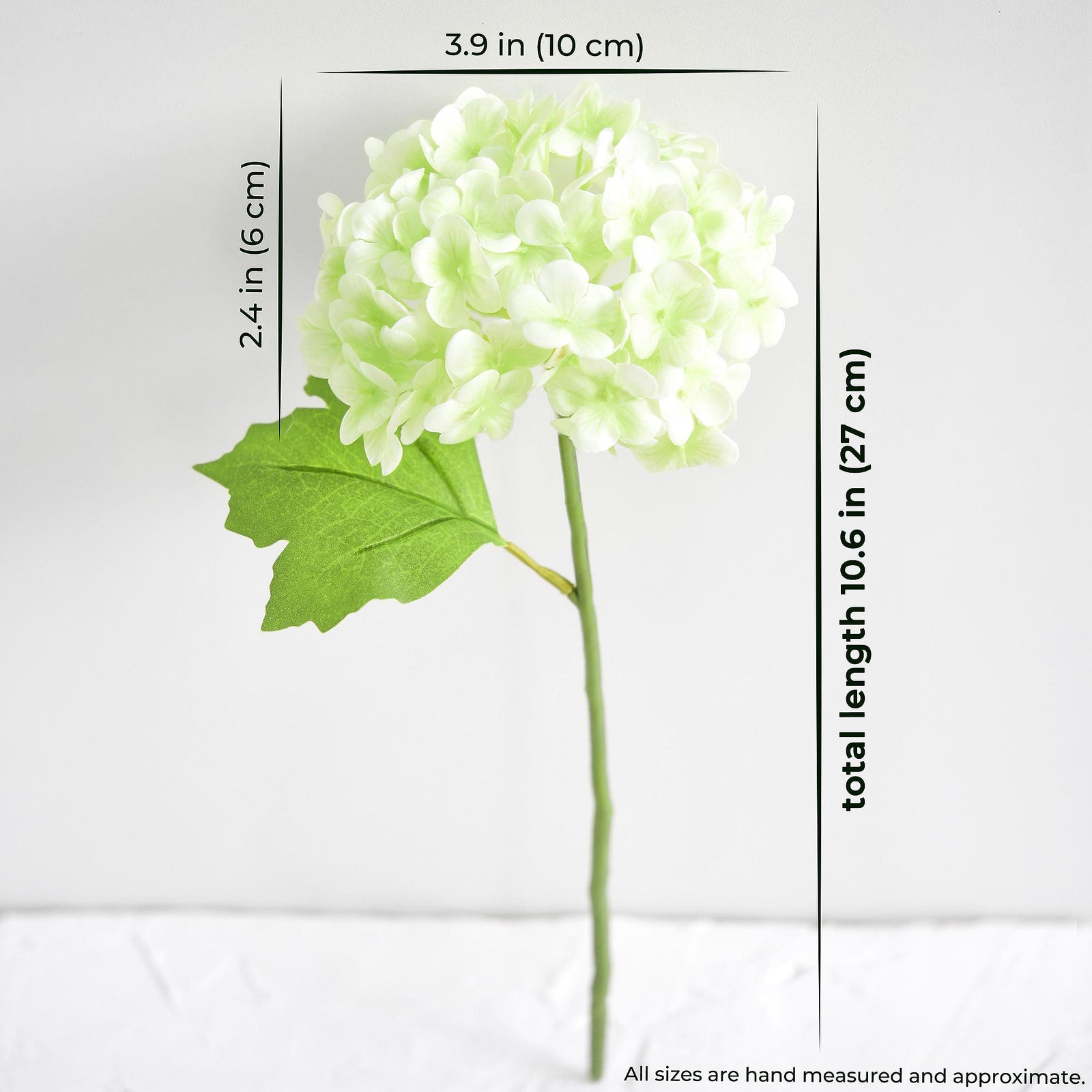 Size guide for one white and green real touch hydrangea stem showing approximate length and bloom measurements.