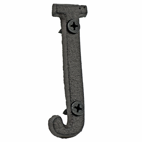 A cast iron house letter sign ‘J’ with white background 