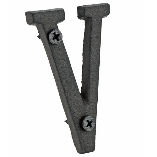 A cast iron house letter sign ‘V’ with white background 