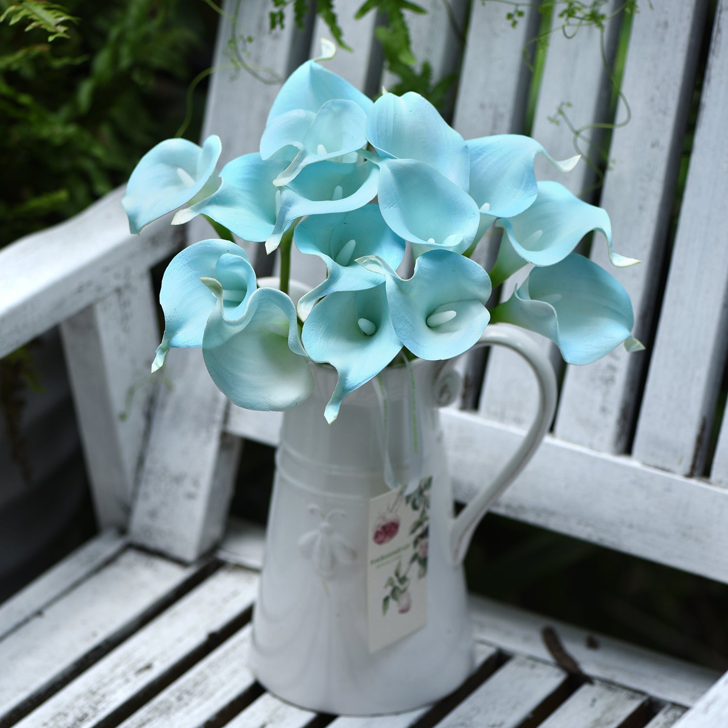 Aqua blue calla lily stems shown in an additional product and styling view.