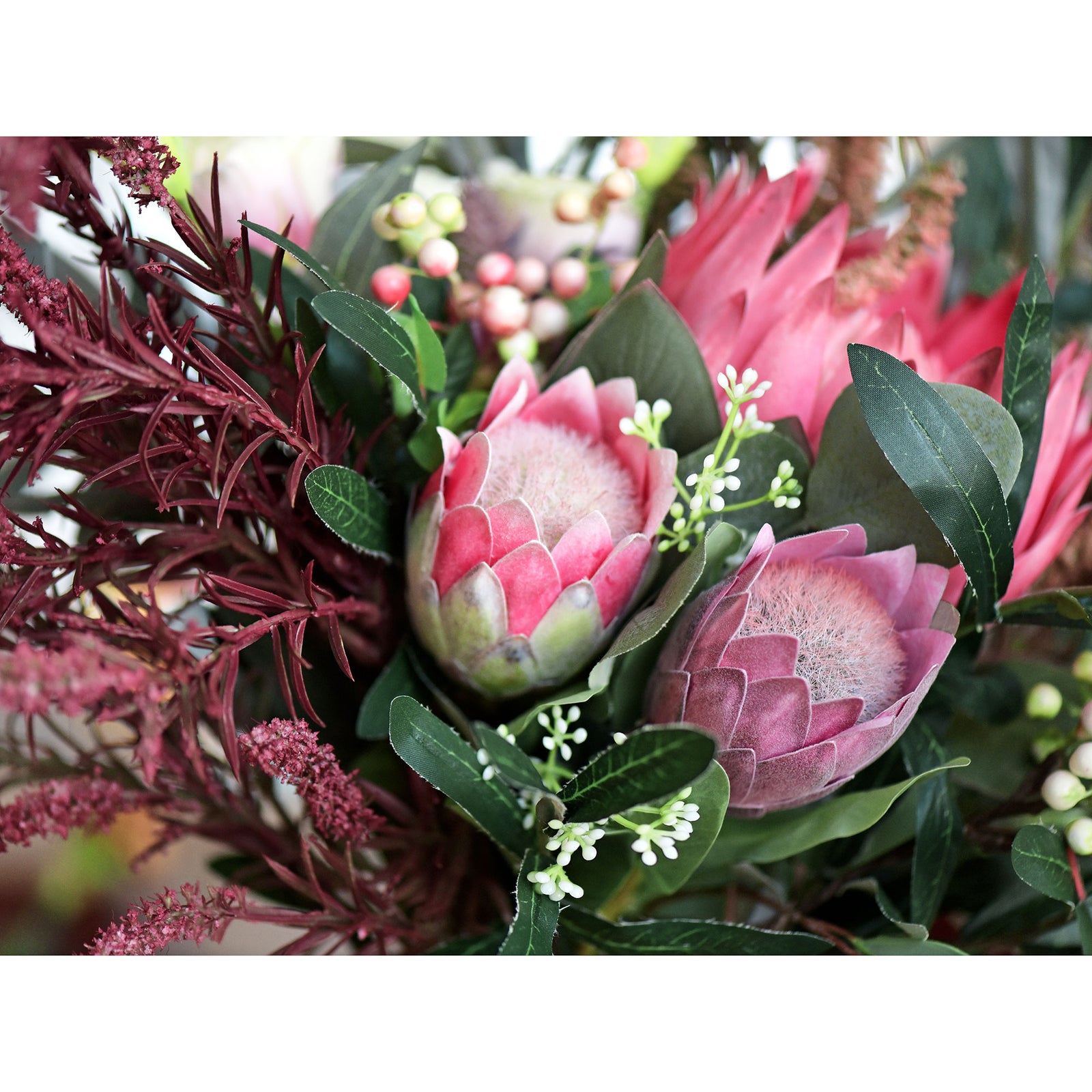 Dusty rose pink artificial protea flowers shown in an alternate product view.