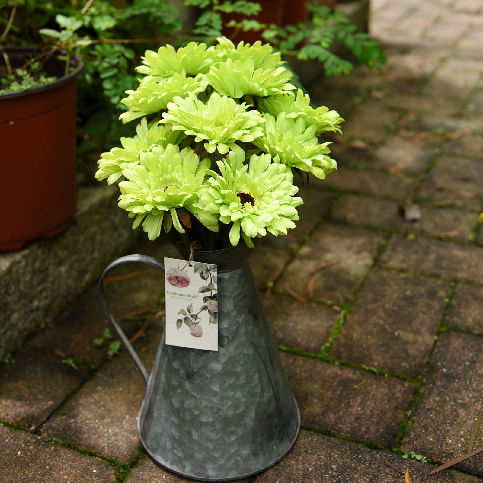 Green silk gerbera flowers shown in an additional artificial flower product view.