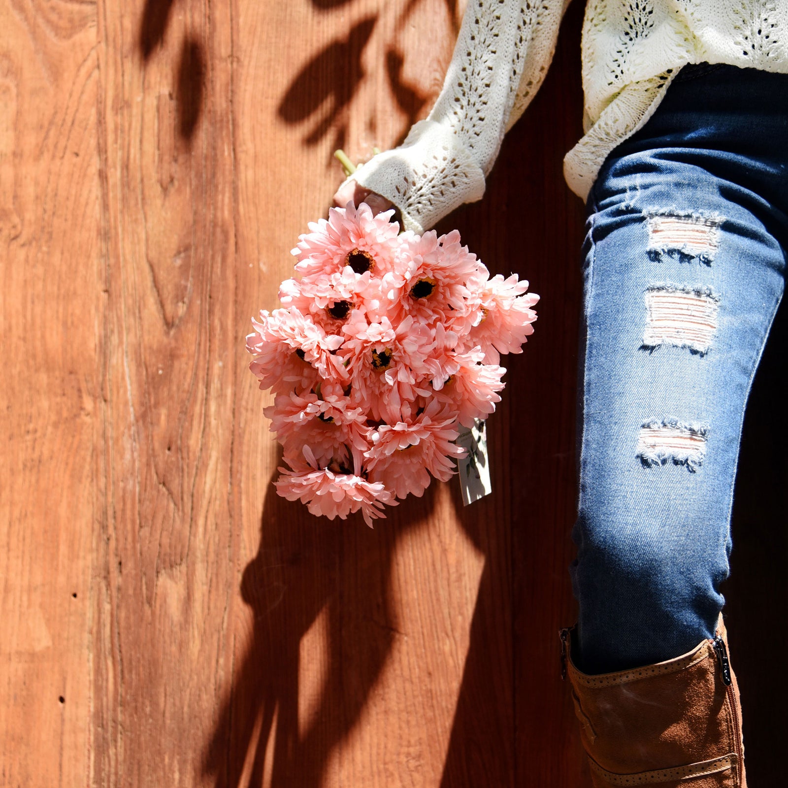 Light pink silk gerbera flowers shown in an additional artificial flower product view.