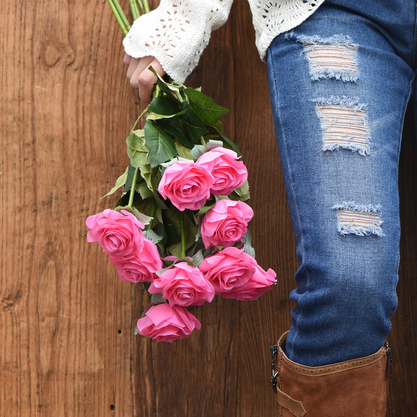 Magenta pink Real Touch roses shown with layered blooms and green stems.