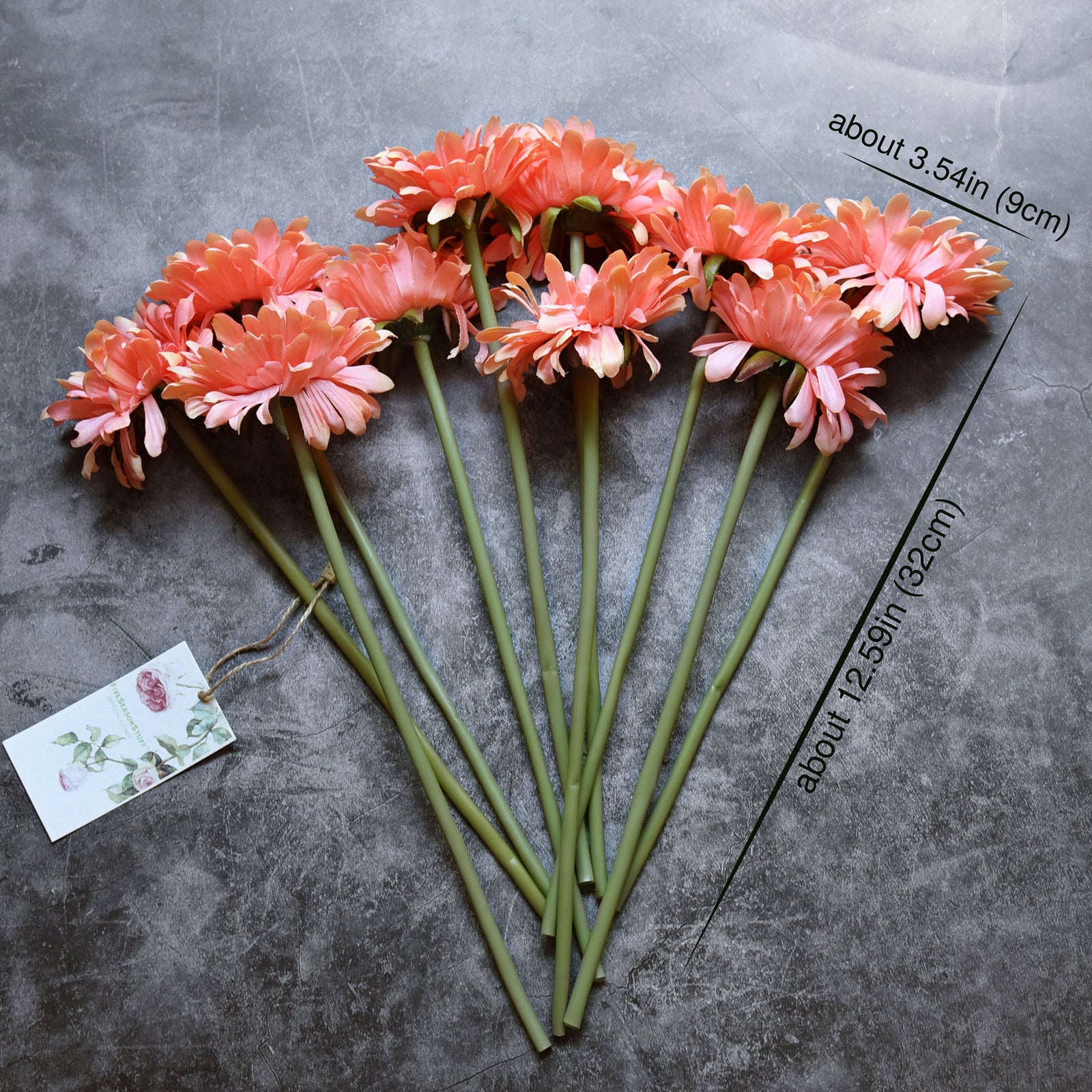 Orange pink silk gerbera stems shown in an alternate product and bouquet view.